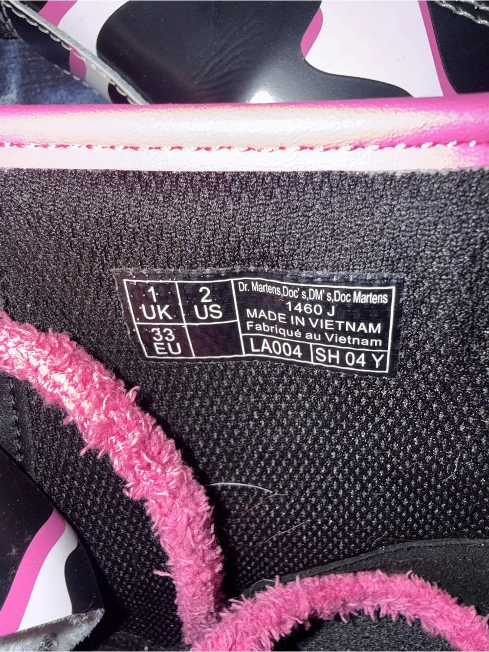 Girls Dr.Martens Pink Accent Black & White Cow Print Boots